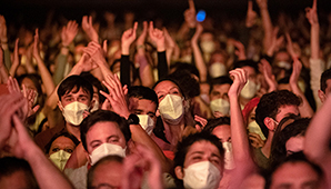 Masks at Concert Credit AP Photo Emilio Morenatti 298x170